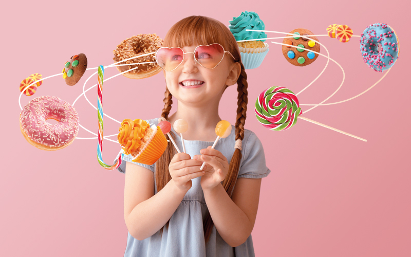 Lebensmittelwerbung für Kinder Ein lächelndes Kind umringt von Süßigkeiten